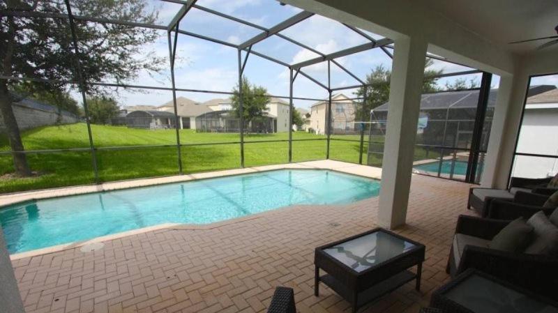Awesome 5 Bedroom 5 Bath Pool In Windsor Hills *