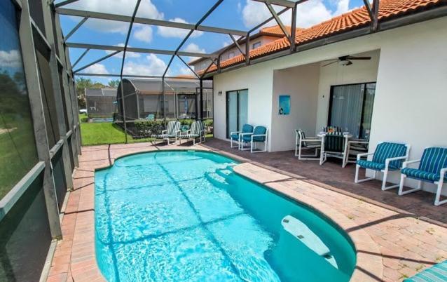 Serene 4-Bedroom Lakeview Retreat With South-Facing Pool & Sun-Drenched Outdoor Living Holiday home